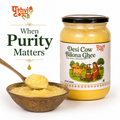 Best desi cow ghee in a jar with a wooden spoon, emphasizing purity and authenticity.